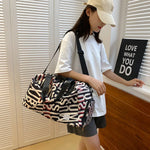 Duffle Bag Water-Resistant Multi-Compartment Padded Handles & Removable Strap