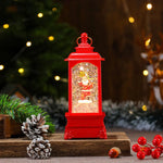 Holiday Lantern Illuminated Snowfall Santa Scene
