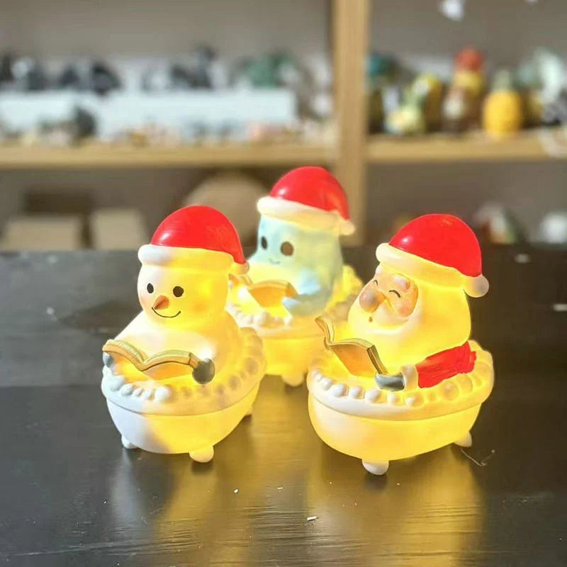 Snowman Figurine Sitting & Reading Battery-Free