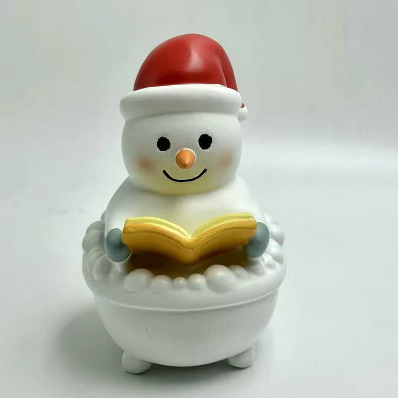 Snowman Figurine Sitting & Reading Battery-Free