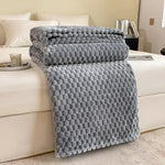 WohlfühlDecke - Luxuriöse Fleece-Decke für Sofa und Bett