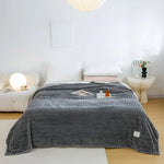 WohlfühlDecke - Luxuriöse Fleece-Decke für Sofa und Bett
