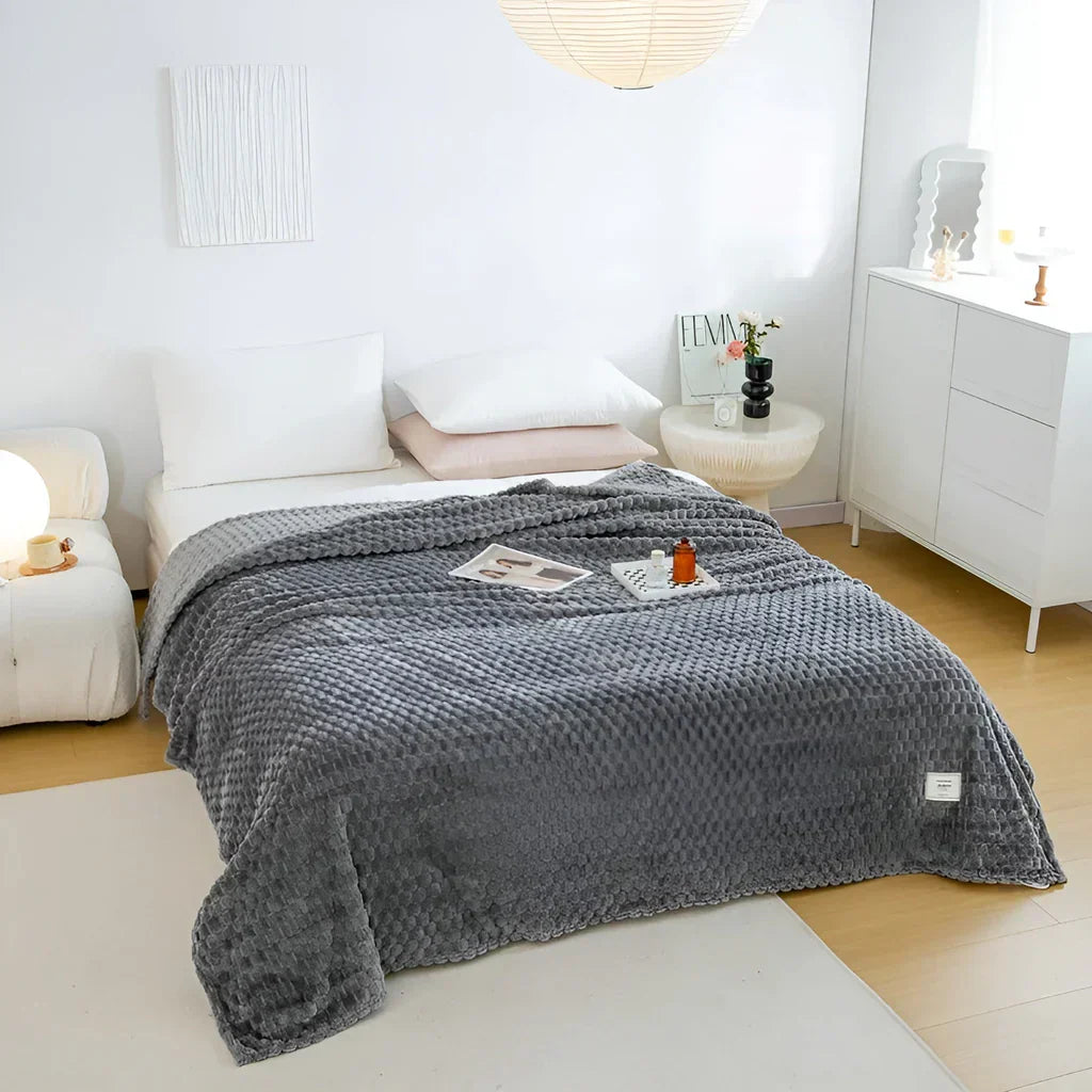 WohlfühlDecke - Luxuriöse Fleece-Decke für Sofa und Bett