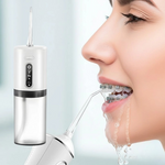 Water jet device for thorough oral hygiene | Flexibly adjustable cleaning modes | Replaceable nozzles