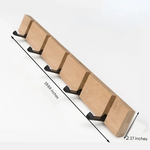 Wooden coat rack with hidden coat hook
