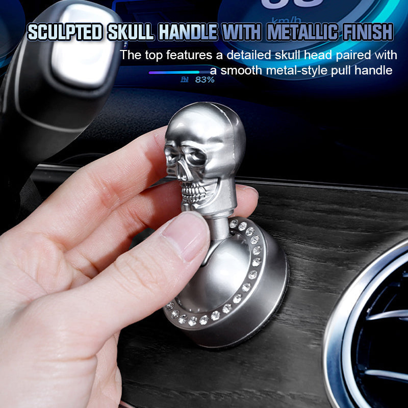 Metallic skull-design start button cover with rhinestones