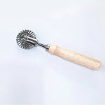 Baking tool with cookie embossing