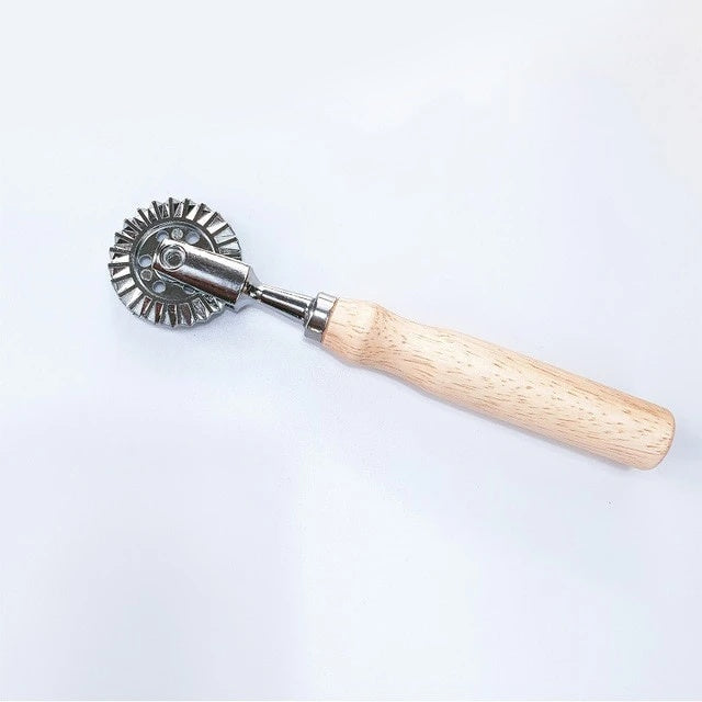 Baking tool with cookie embossing