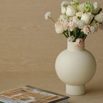 Elegant, minimalist design with a sleek, curved silhouette