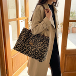 Elegant leopard print pouches with gold chain