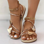 Elegant sandals with heart appliqués and metallic straps