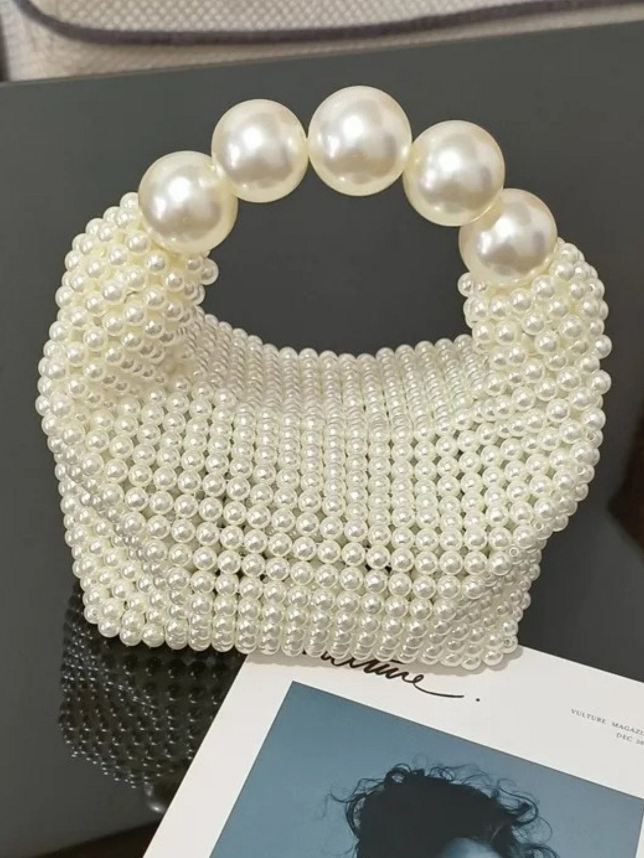 Glamorous vintage handbag with pearl embellishment