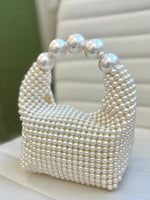 Glamorous vintage handbag with pearl embellishment