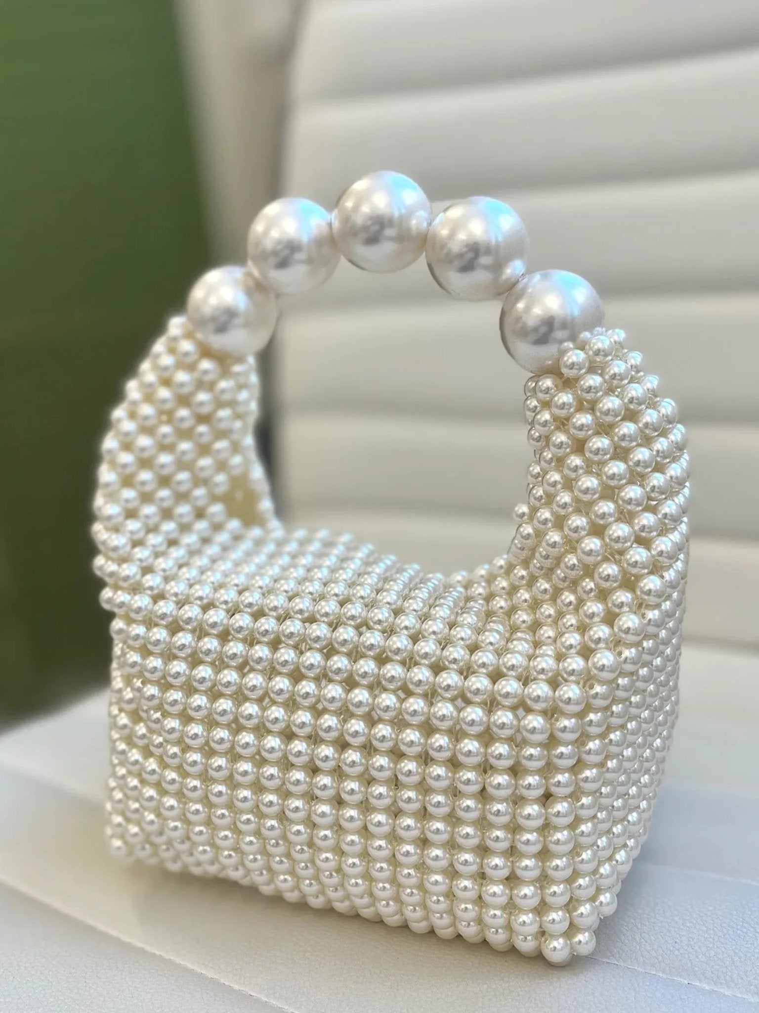 Glamorous vintage handbag with pearl embellishment