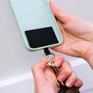 Stylish carrying strap for smartphones and cards