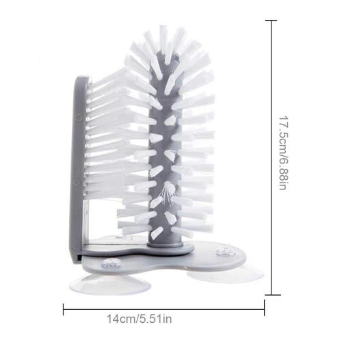 Double-sided glass cleaner with brush