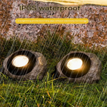 Cobblestone lighting for gardens and outdoor areas
