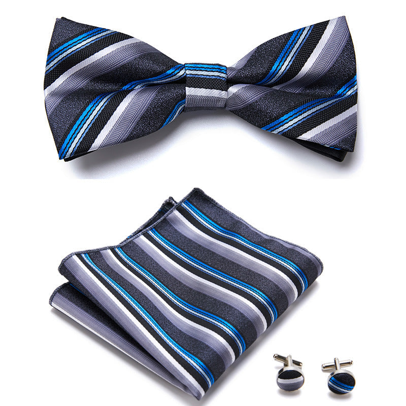 Elegantes Set mit stilvollen Fliegen und Accessoires