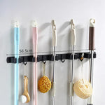 Stable wall organizer for garden tools made of stainless steel
