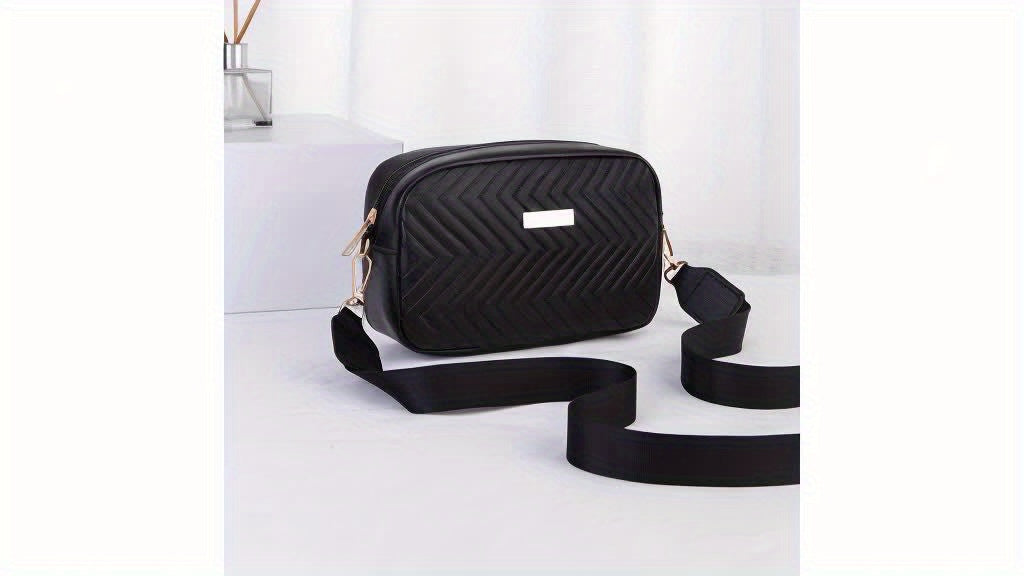 Black sequinned padded PU cross body bag with detachable strap