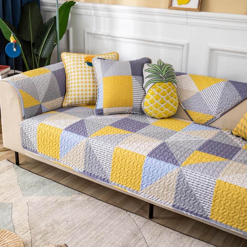 Washable cotton sofa throw with an ornate geometric pattern