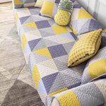 Washable cotton sofa throw with an ornate geometric pattern