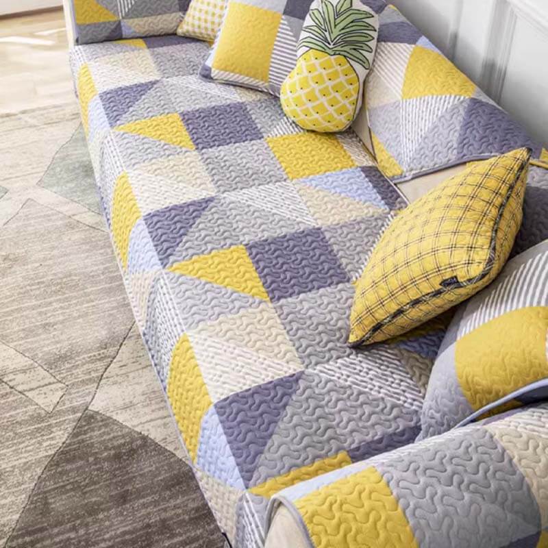 Washable cotton sofa throw with an ornate geometric pattern