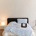 Vielseitige Decke für jedes Wetter mit Stil