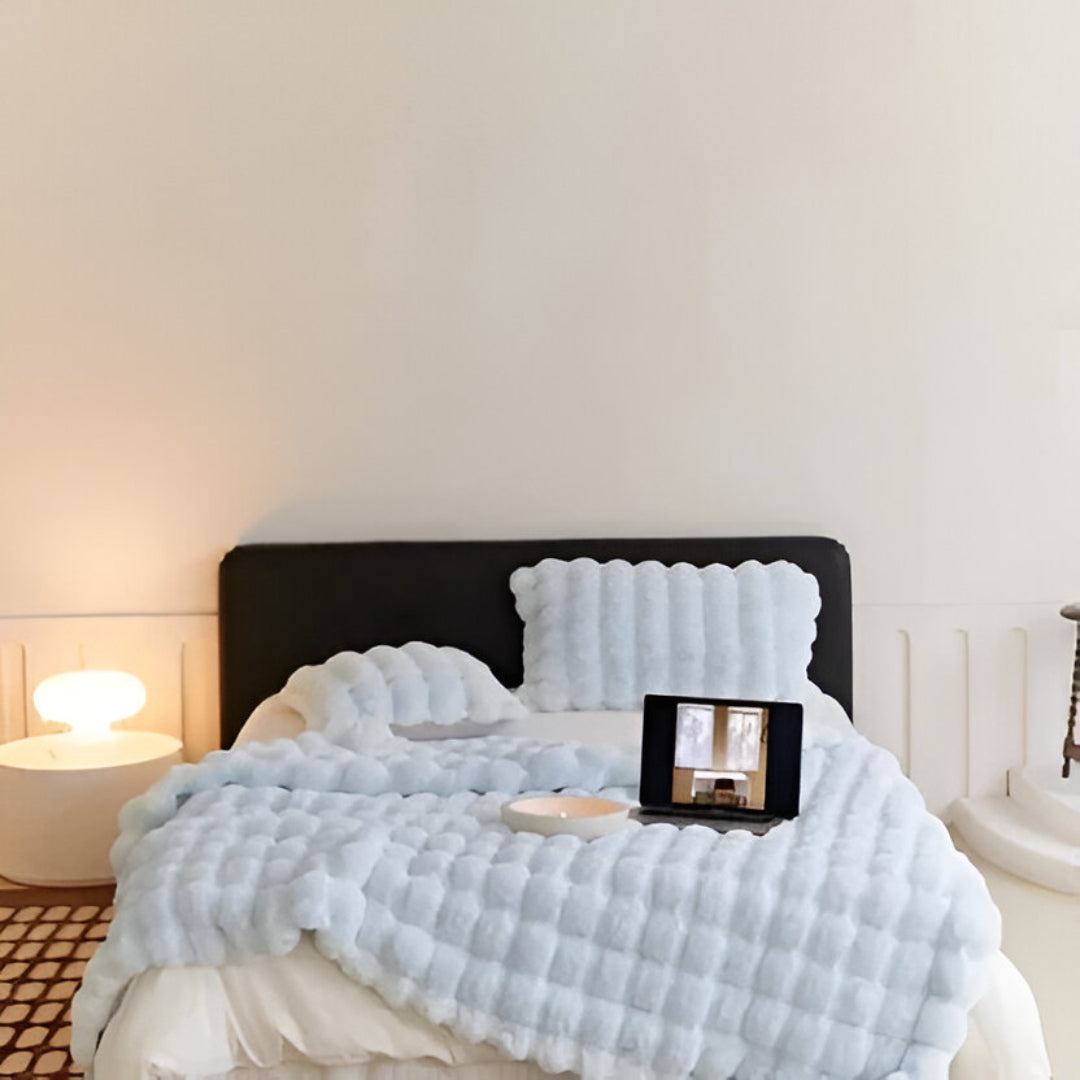 Vielseitige Decke für jedes Wetter mit Stil