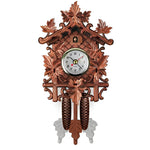 Traditional cuckoo clock with filigree embellishments