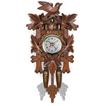 Traditional cuckoo clock with filigree embellishments