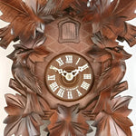 Traditional cuckoo clock with filigree embellishments