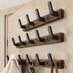 Stylish wall coat hook made of wood and metal