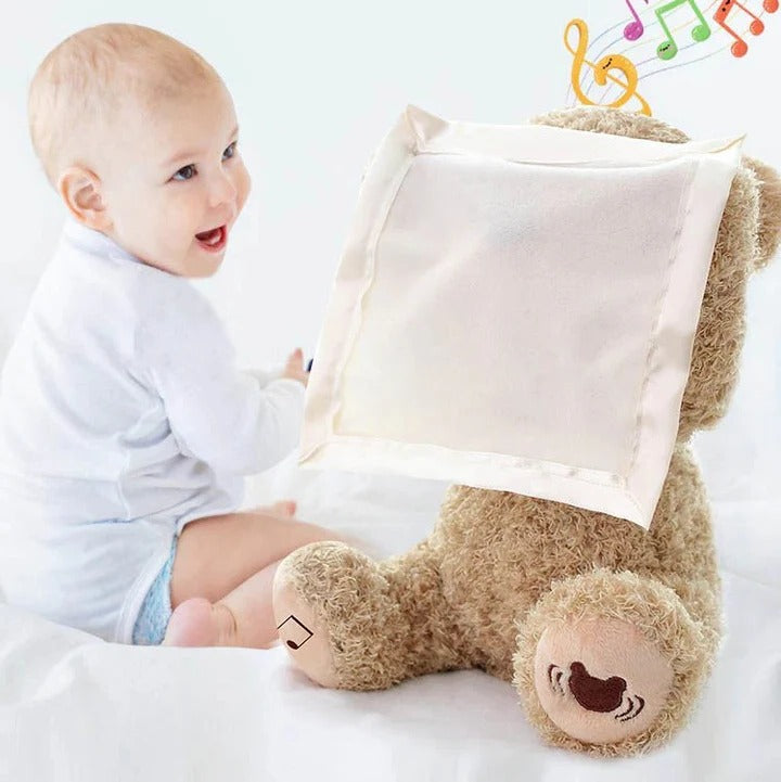 Interactive cuddly bear with music and movement
