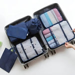 Travel organizing set of 7 bags with mesh windows