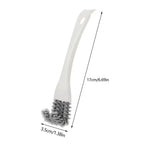 Grill cleaning brush with V-shaped head and scraper
