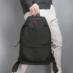 Black Backpack with Various Compartments