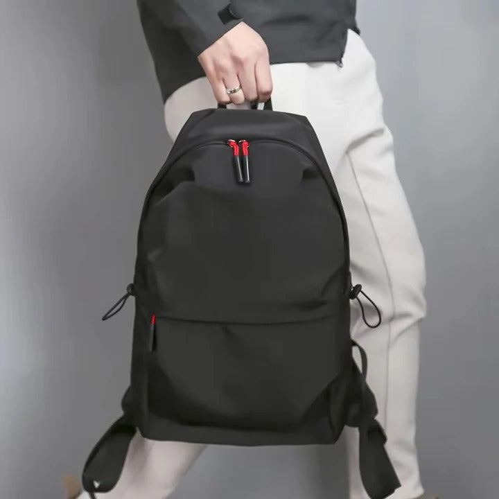 Black Backpack with Various Compartments