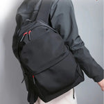 Black Backpack with Various Compartments
