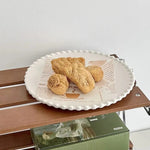 Elegant ceramic dinnerware with beaded rim design