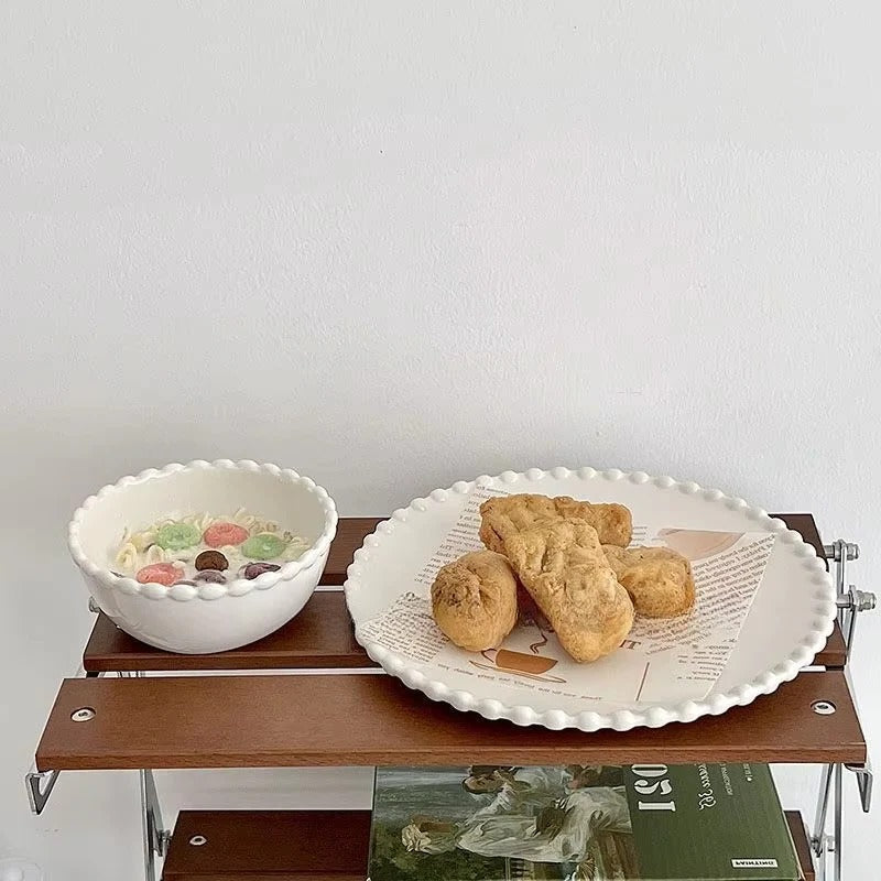 Elegant ceramic dinnerware with beaded rim design