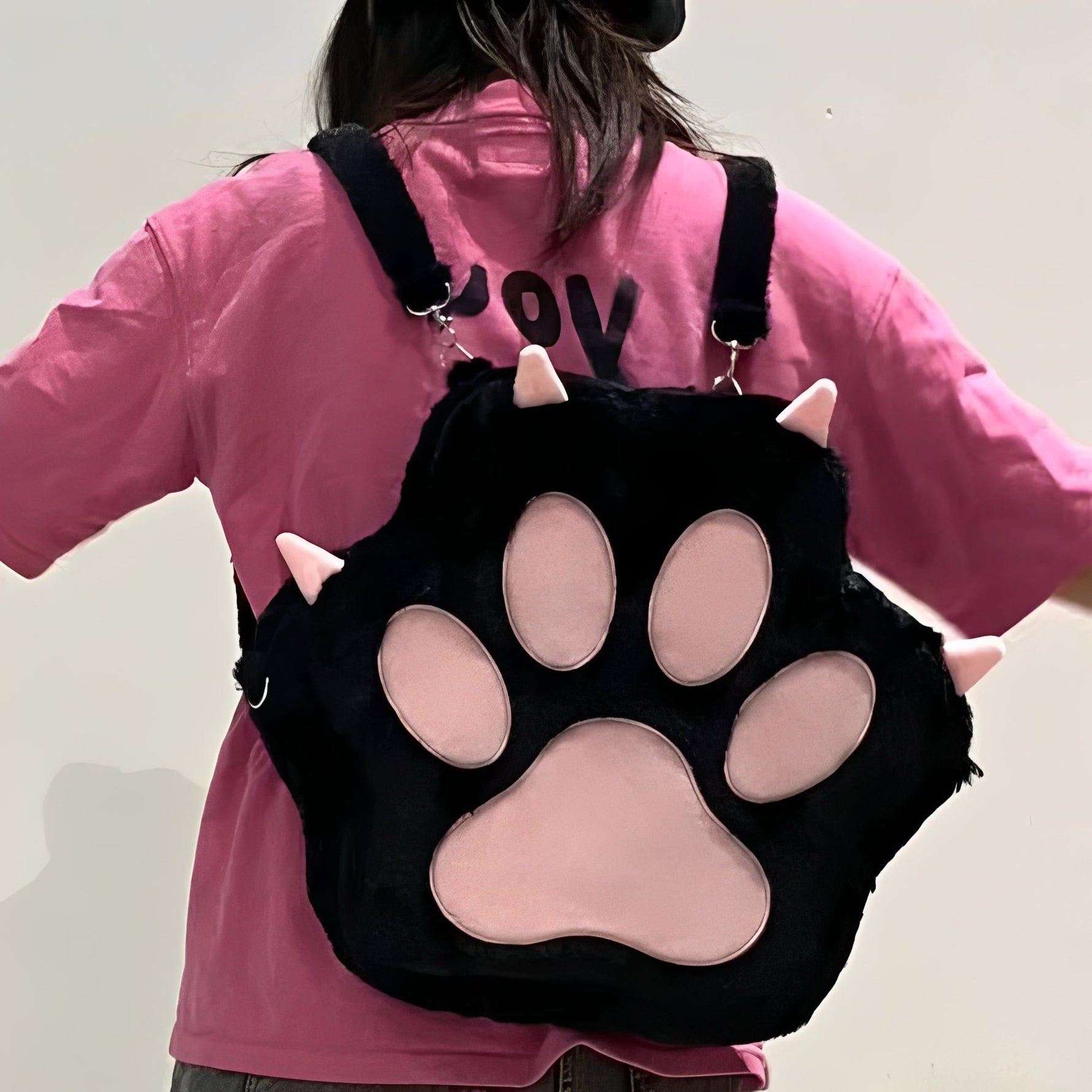 Verspielter Rucksack mit Katzenpfoten-Muster und verstellbaren Trägern