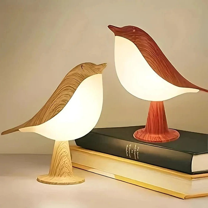Stimmungsvolle Tischlampe im Vogeldesign mit Farbwechsel