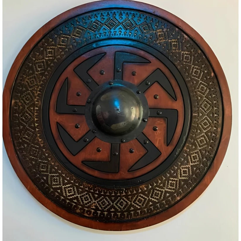 Round wooden shield in medieval style with unique patterns