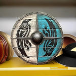 Round wooden shield in medieval style with unique patterns