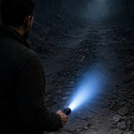 Rechargeable flashlight with adjustable focus and laser