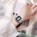 Classic digital watch in vintage style with stainless steel strap and LED display