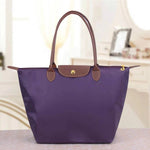 Vielseitige Schultertasche aus strapazierfähigem Material in neun Farben