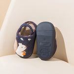 Comfortable kids' fleece slippers with a bear cartoon motif