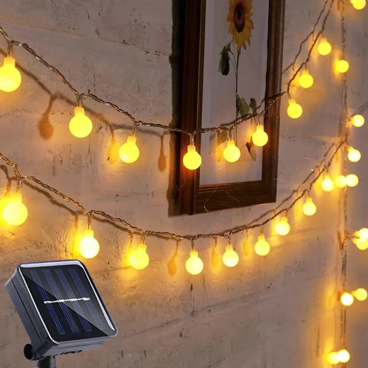Solar-powered outdoor string lights